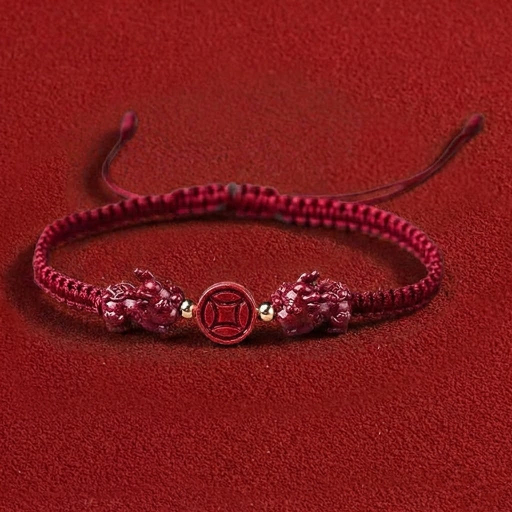 Red bracelet with decorative elements on a red background