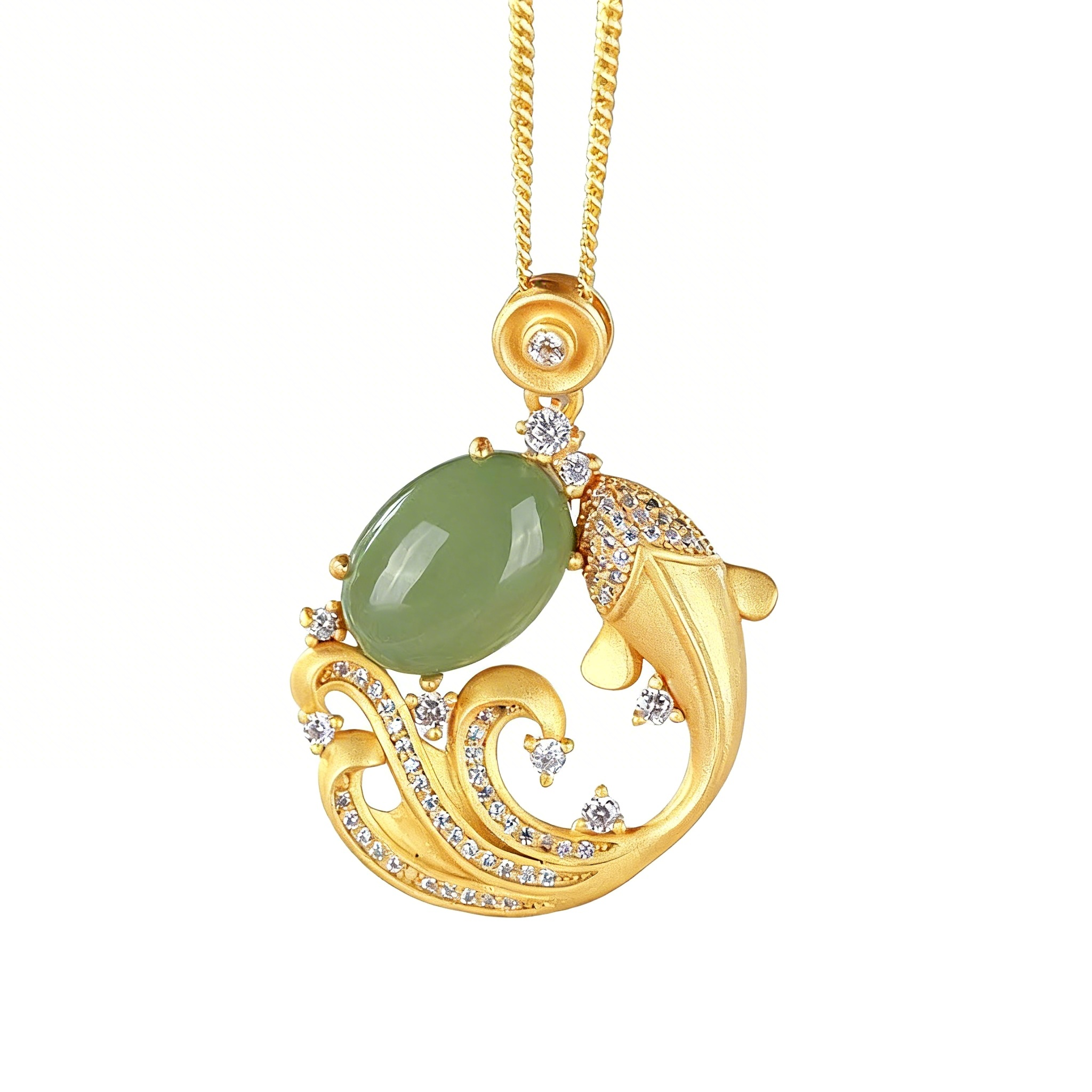 Gold pendant with green gemstone on a white background
