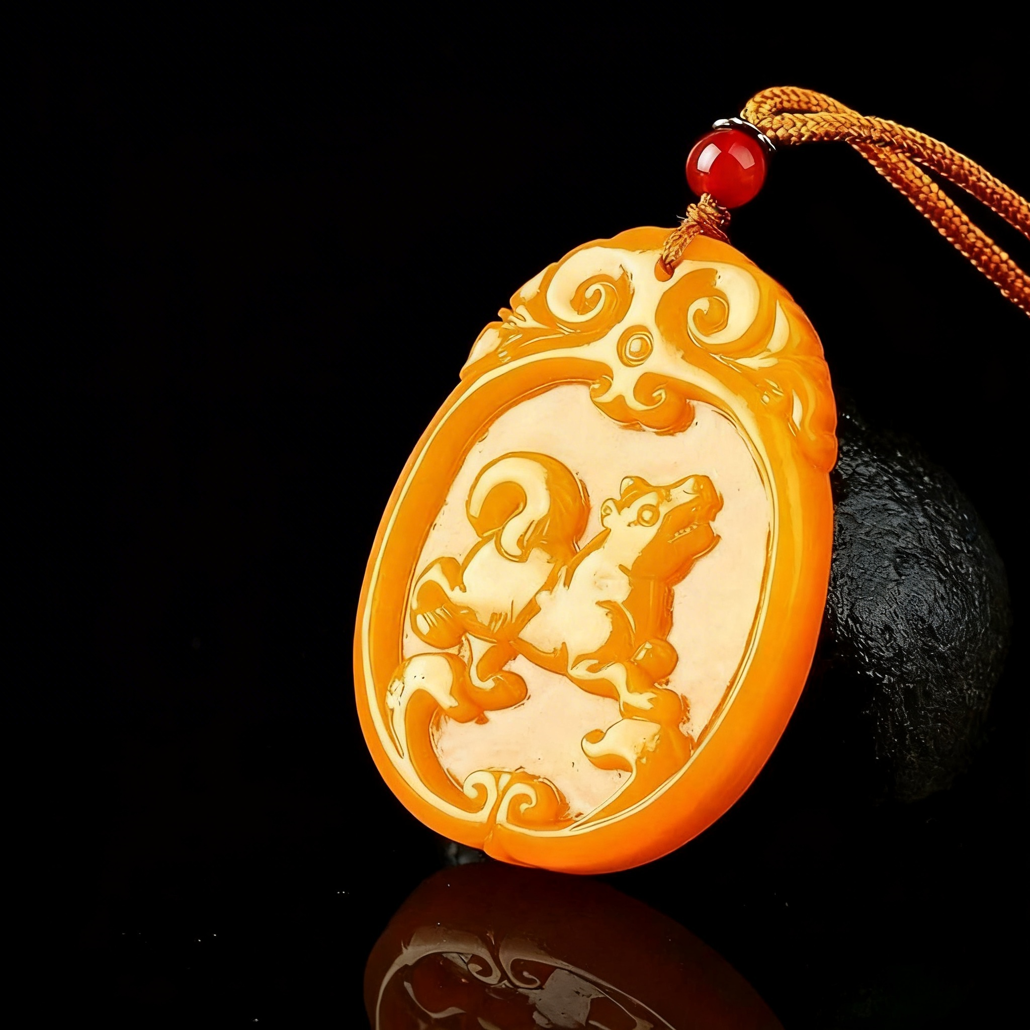 Decorative pendant with intricate design on a black background