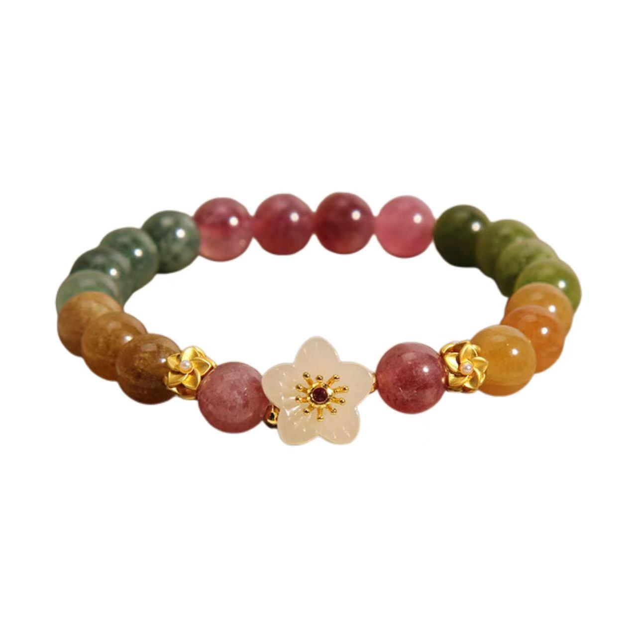 Multicolored beaded bracelet with a floral charm on a white background