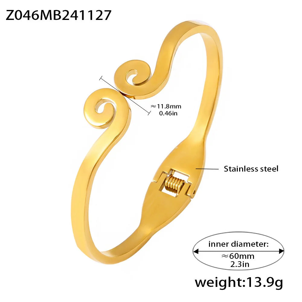 Gold bracelet with measurements and material details on a white background