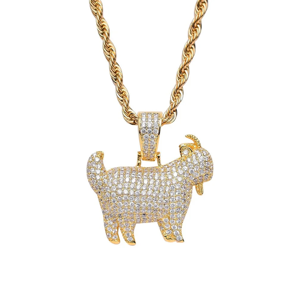 Gold goat pendant necklace with clear stones on a white background