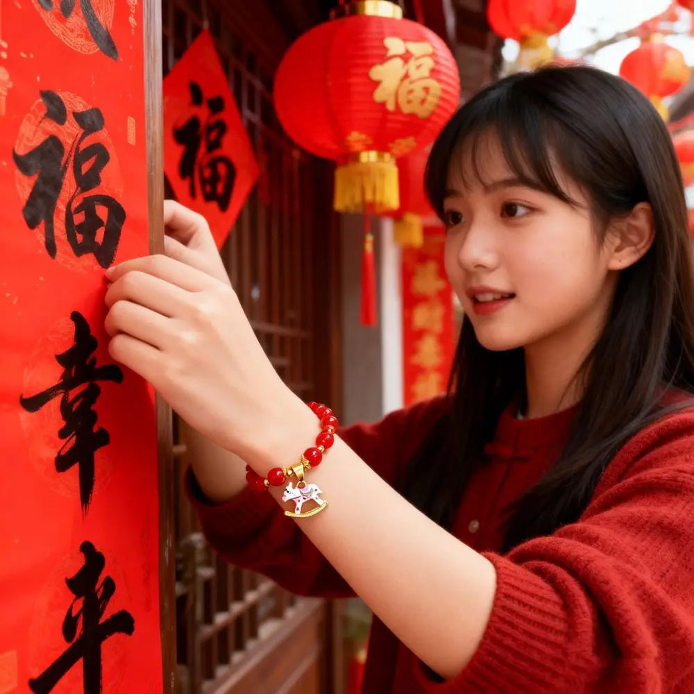 Woman in red sweater with red lanterns and Chinese characters in the background