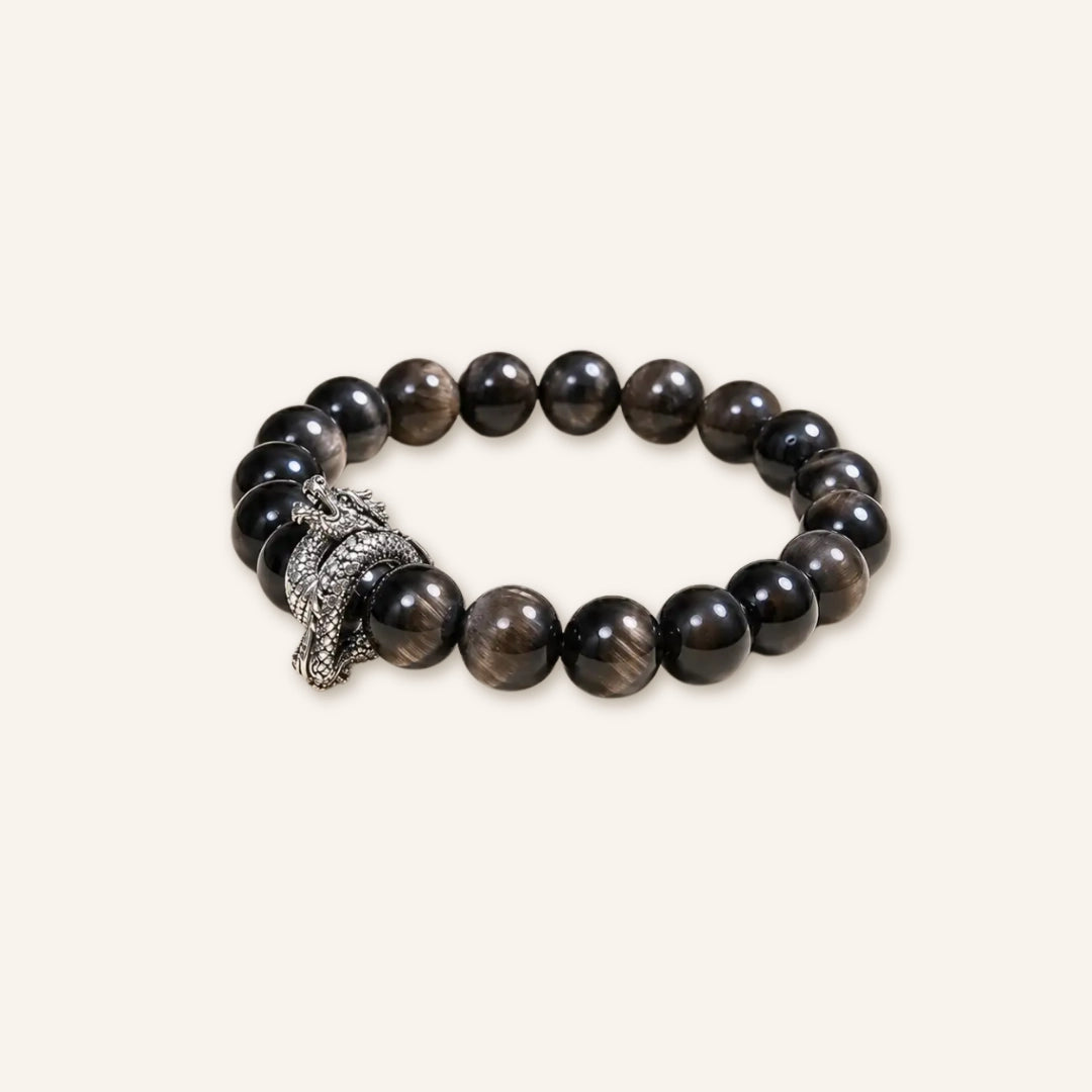 Silver sheen obsidian bracelet by TheFuMaster