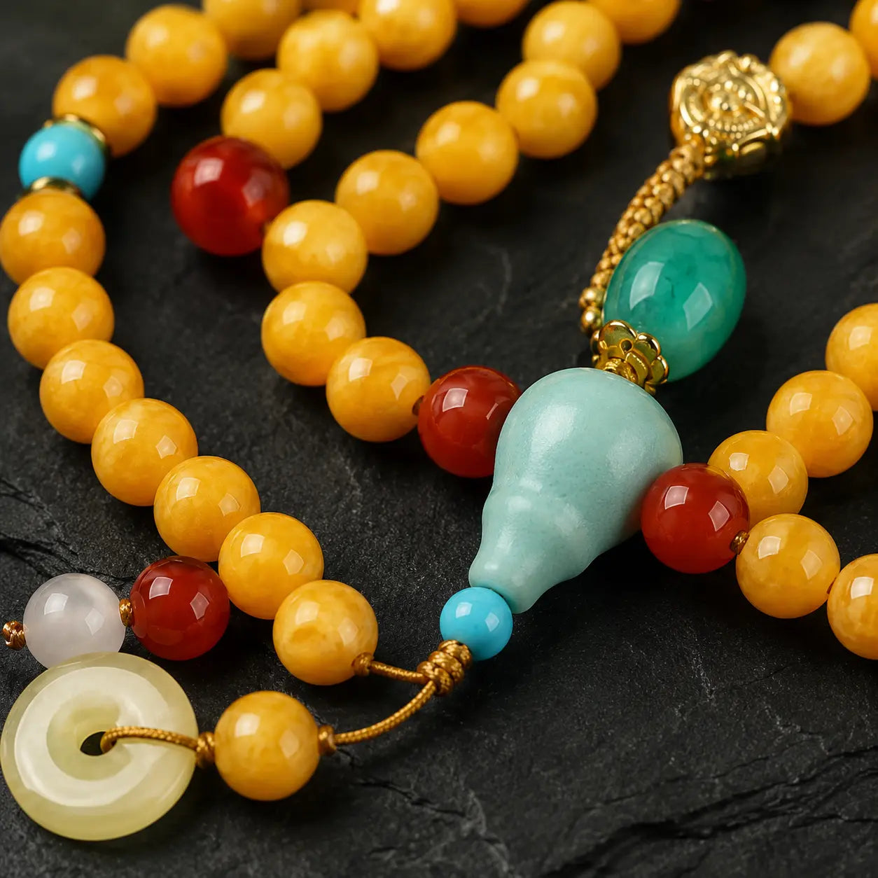 Amber 108 Wrist Mala shown from another angle with turquoise and amber