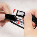 TheFuMaster black leather bracelet with obsidian beads styled on hand
