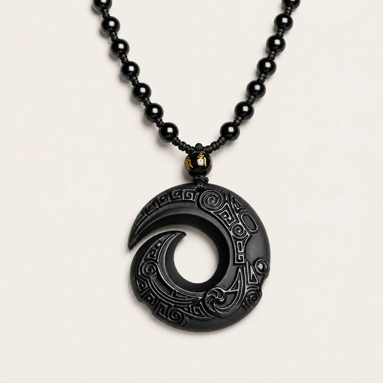 Black obsidian spiral pendant necklace by TheFuMaster