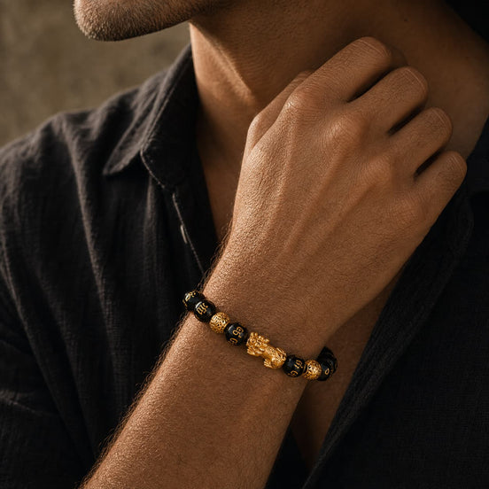Black pixiu symbol bracelet worn on the wrist