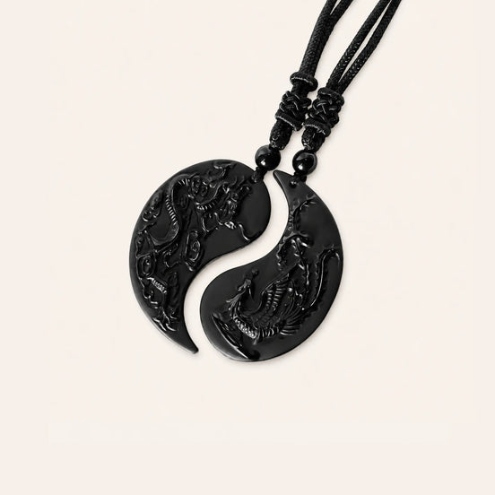 Dragon phoenix obsidian couple pendants by TheFuMaster