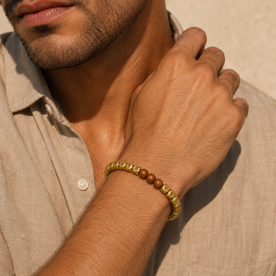 Brass symbol bracelet worn on the wrist