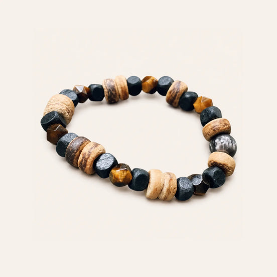 Brown eye wood stone bracelet by TheFuMaster