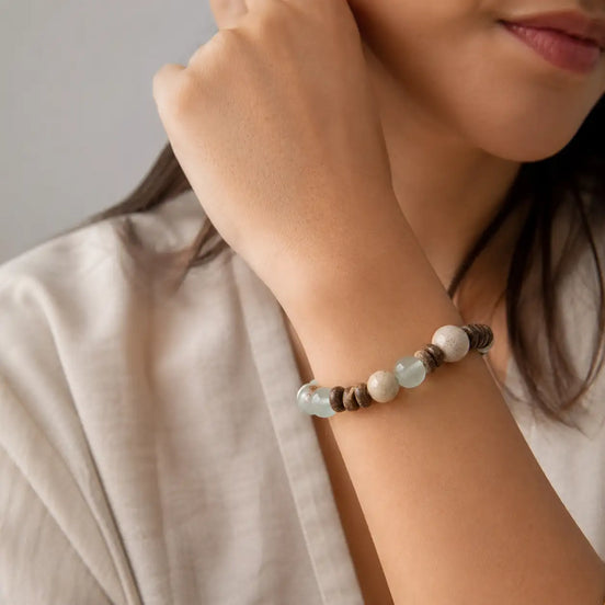 Coconut shell chalcedony bracelet worn on the wrist