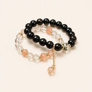 Dark and light obsidian crystal bracelet by TheFuMaster