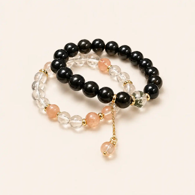 Dark and light obsidian crystal bracelet by TheFuMaster