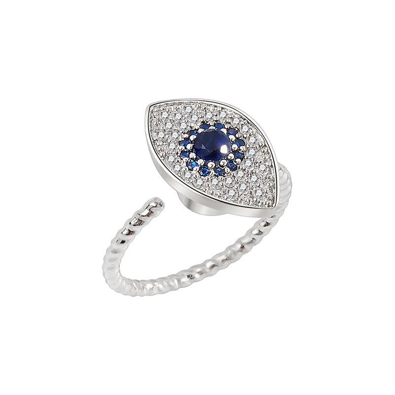 Silver ring with a blue gemstone in the center on a white background