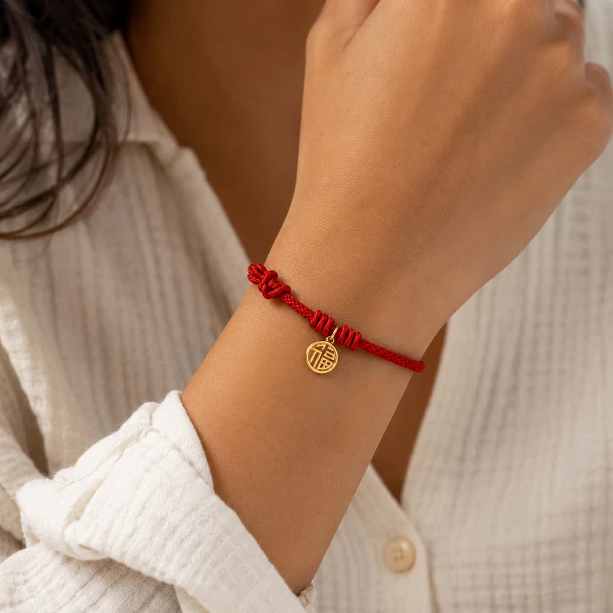 Close-up of Fu Knot Red String Bracelet with red string