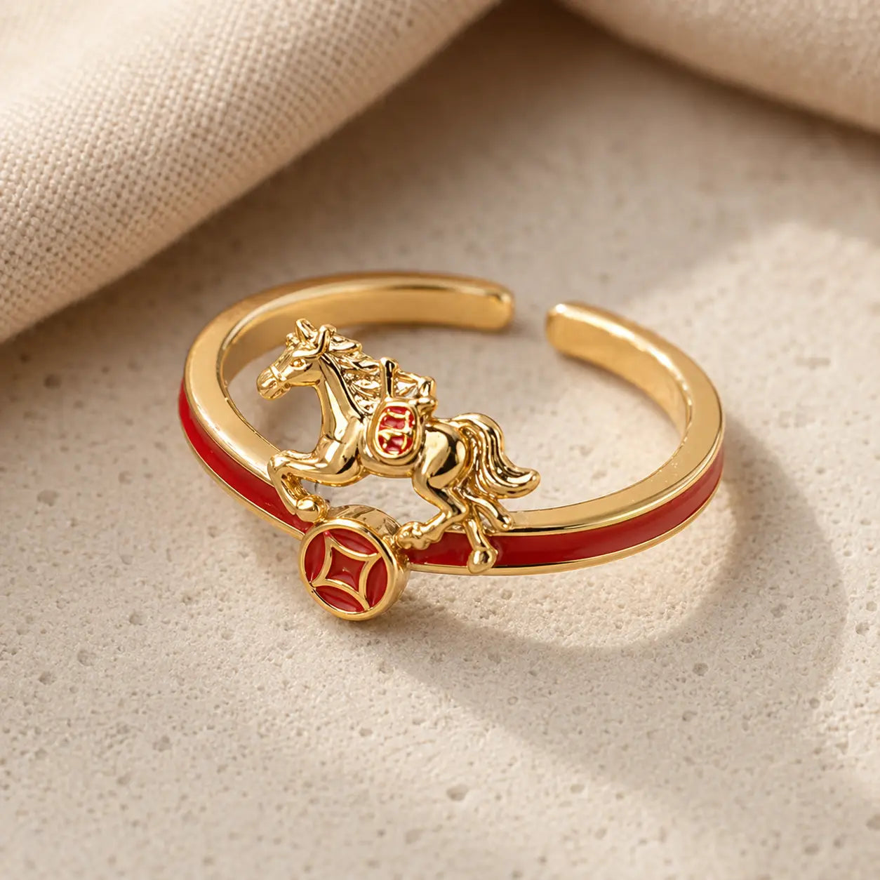 Close-up detail of Galloping Fortune Zodiac Horse Coin Ring with horse coin charm
