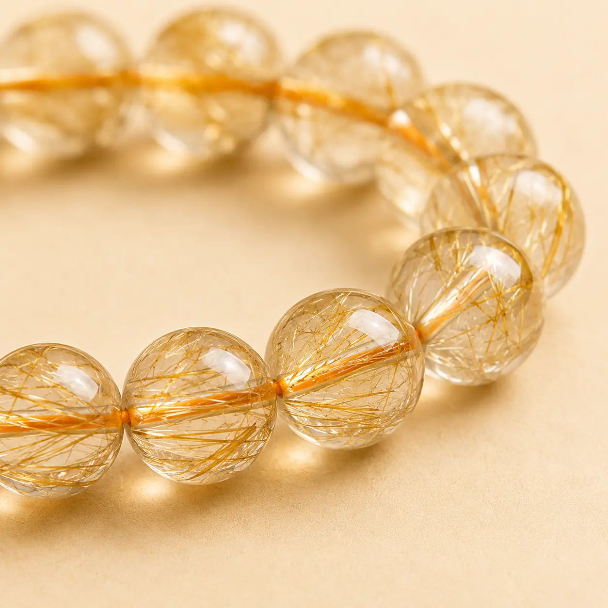 Gold Rutilated Quartz Bracelet shown from another angle with rutilated quartz