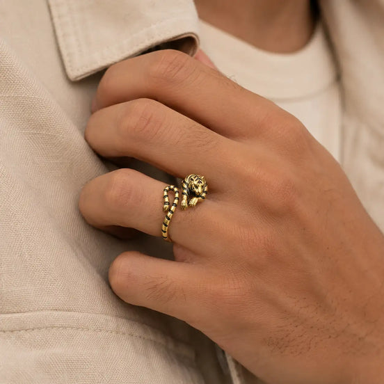 Gold zodiac tiger ring worn on the hand