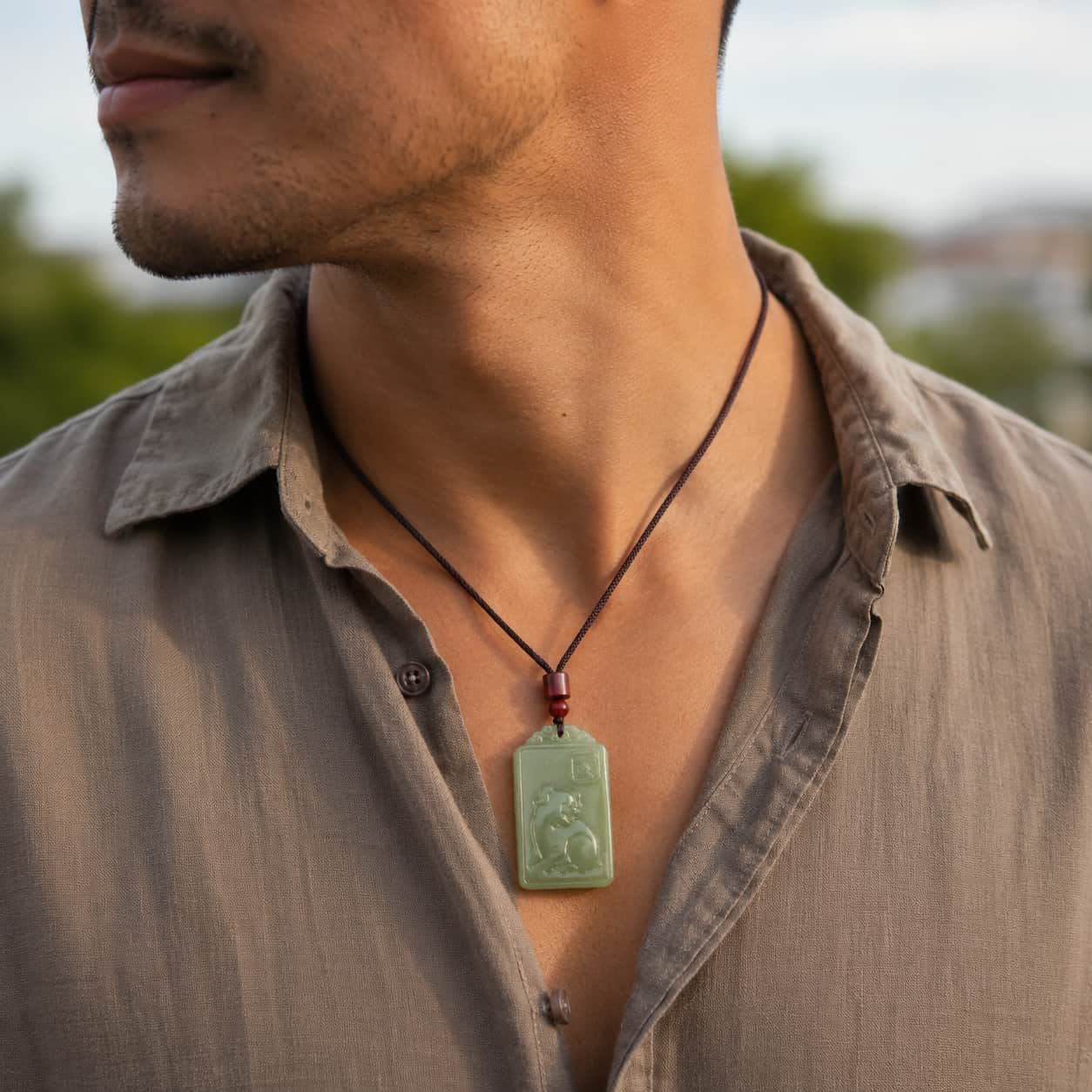Green Dongling Jade Zodiac Pig Pendant alternate view showing smooth green jade texture by TheFuMaster