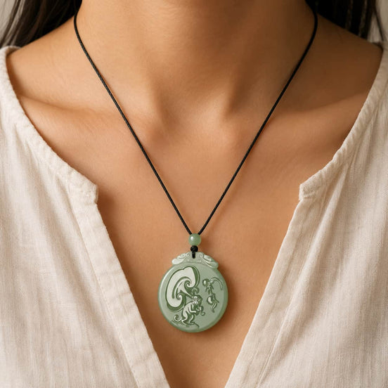 Close-up of Green Jade Monkey Zodiac Pendant with green jade