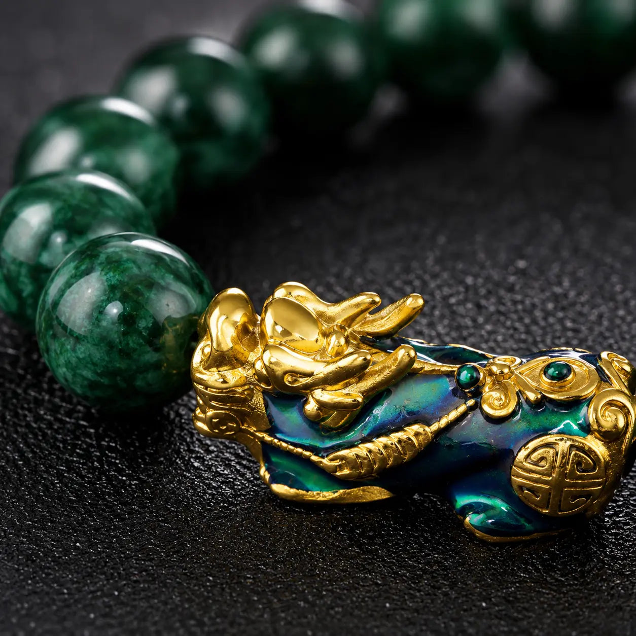 Green Jade Pixiu Bracelet shown from another angle with green jade and pixiu