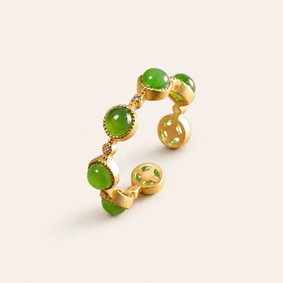 Green jade stone ring by TheFuMaster