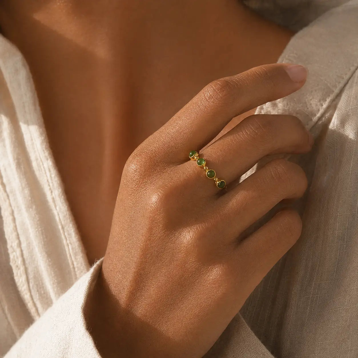 Quiet Fortune Green Jade Stone Ring worn on hand with green gemstones