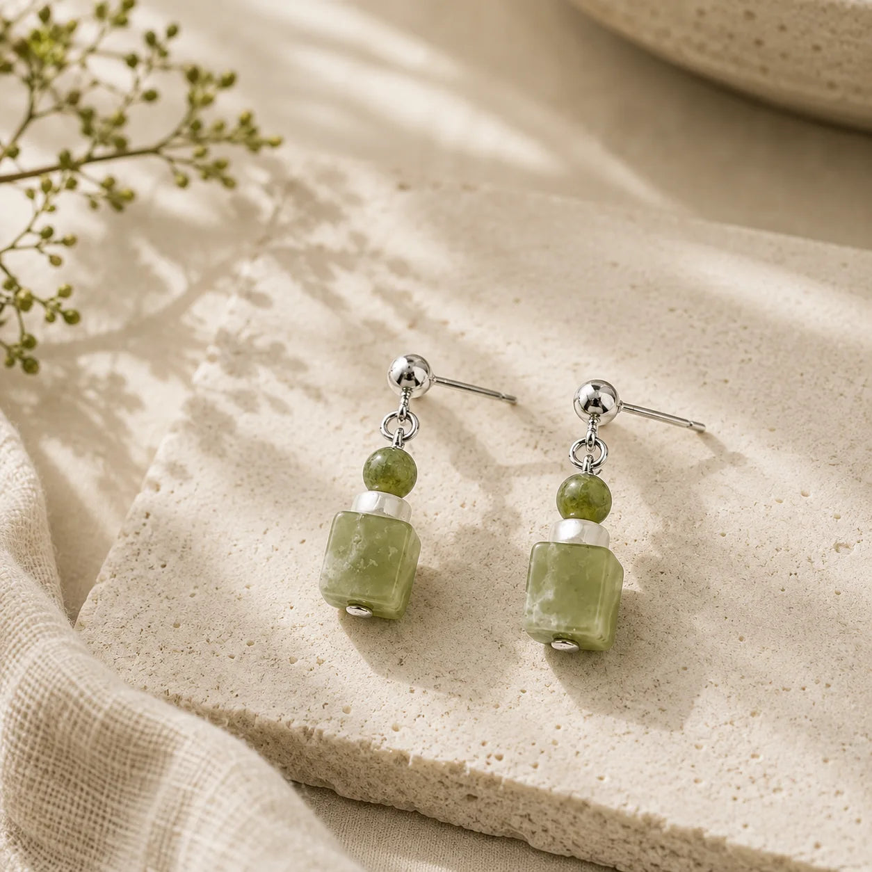 Green Xiuyan Jade Shell Stud Earrings detail view with green jade
