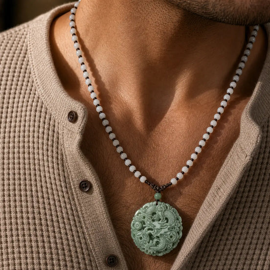 Jade dragon pendant worn as a necklace