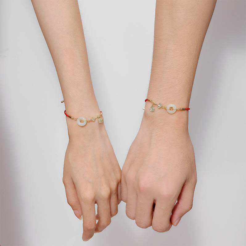Couple style shot of TheFuMaster Peace & Fortune red rope bracelets — perfect symbolic gift for loved ones
