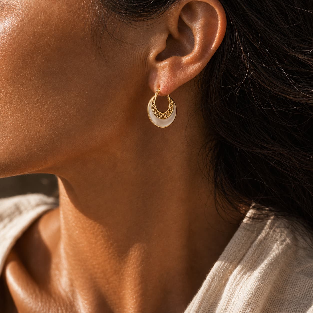 Close-up of Jade Moon Gold Hoop Earrings