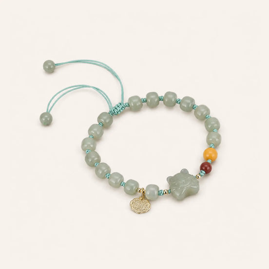 Jade zodiac coin bracelet by TheFuMaster