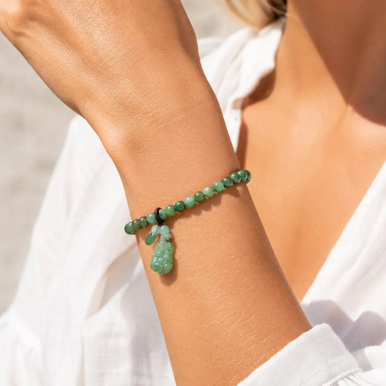 Laughing Buddha jade bracelet for joy, luck, and positive energy by TheFuMaster