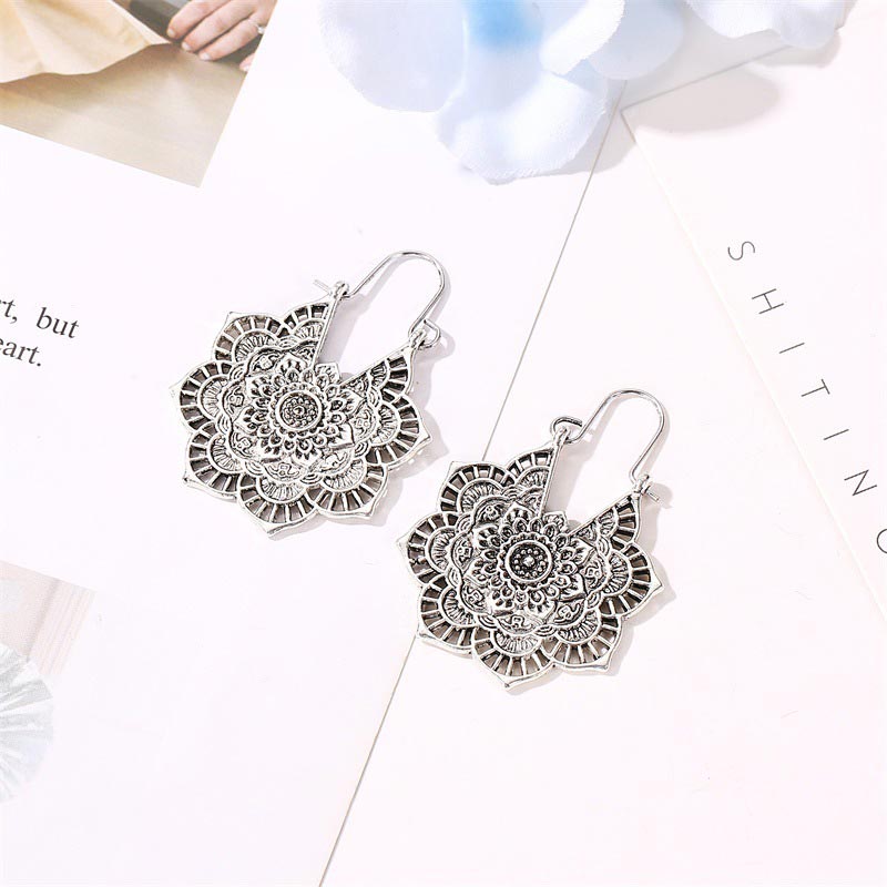 Lotus Engraving Earrings collection by TheFuMaster displayed in both copper and silver tones