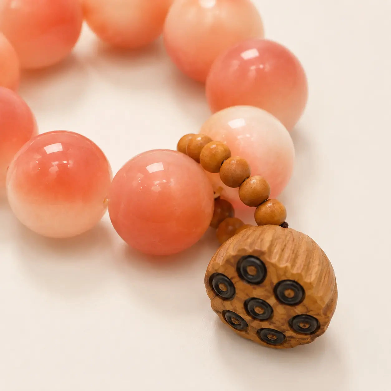 Lotus Pod Bodhi Root Handheld Beads detail view with bodhi and lotus