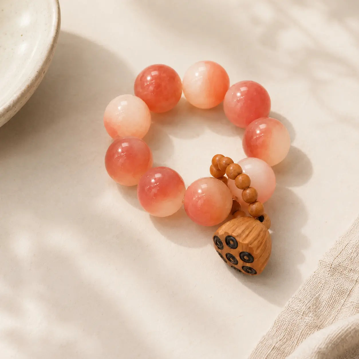 Lotus Pod Bodhi Root Handheld Beads shown from another angle with bodhi and lotus