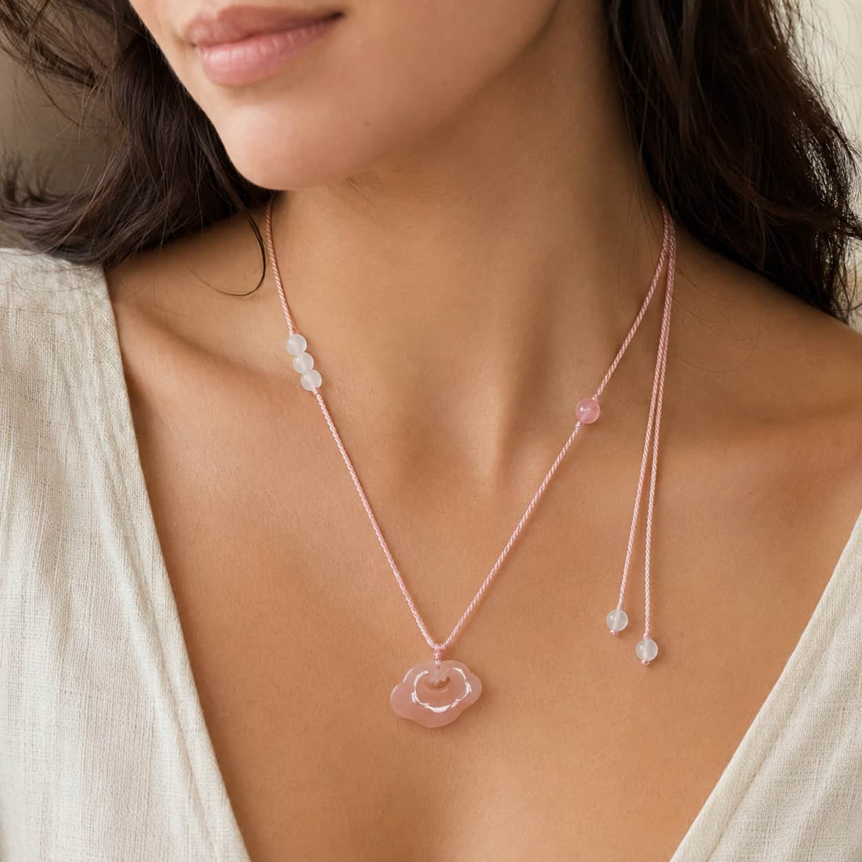 Close-up of Peach Blossom Lock Pendant Necklace
