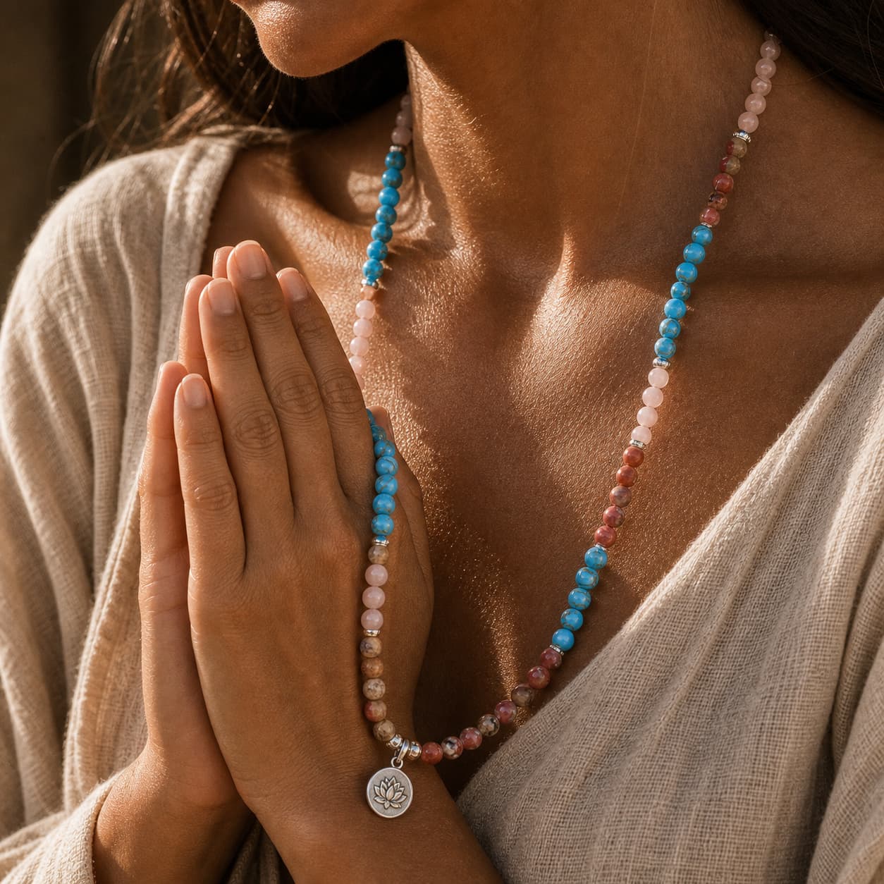 Close-up of Purple Lotus 108 Mala with lotus