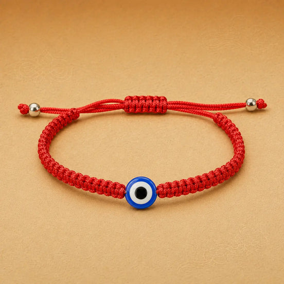Red rope evil eye bracelet by TheFuMaster
