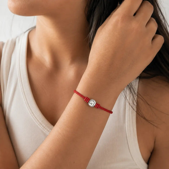Red rope zodiac horse bracelet worn on the wrist