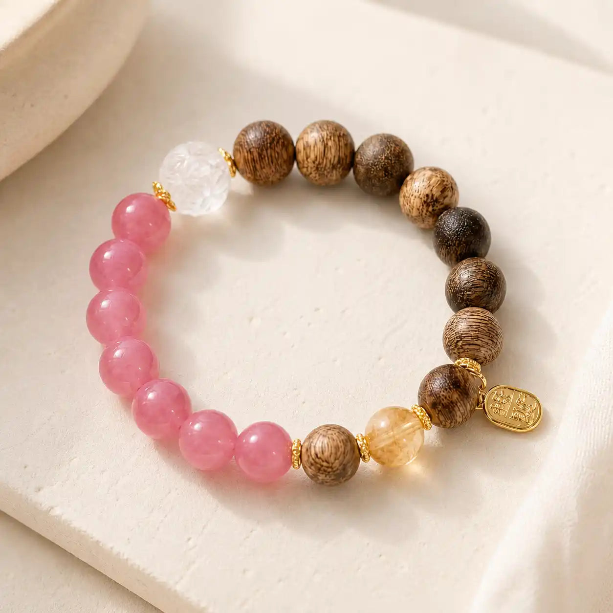 Rose Quartz Wood Lotus Bracelet detail view with clear quartz and rose quartz