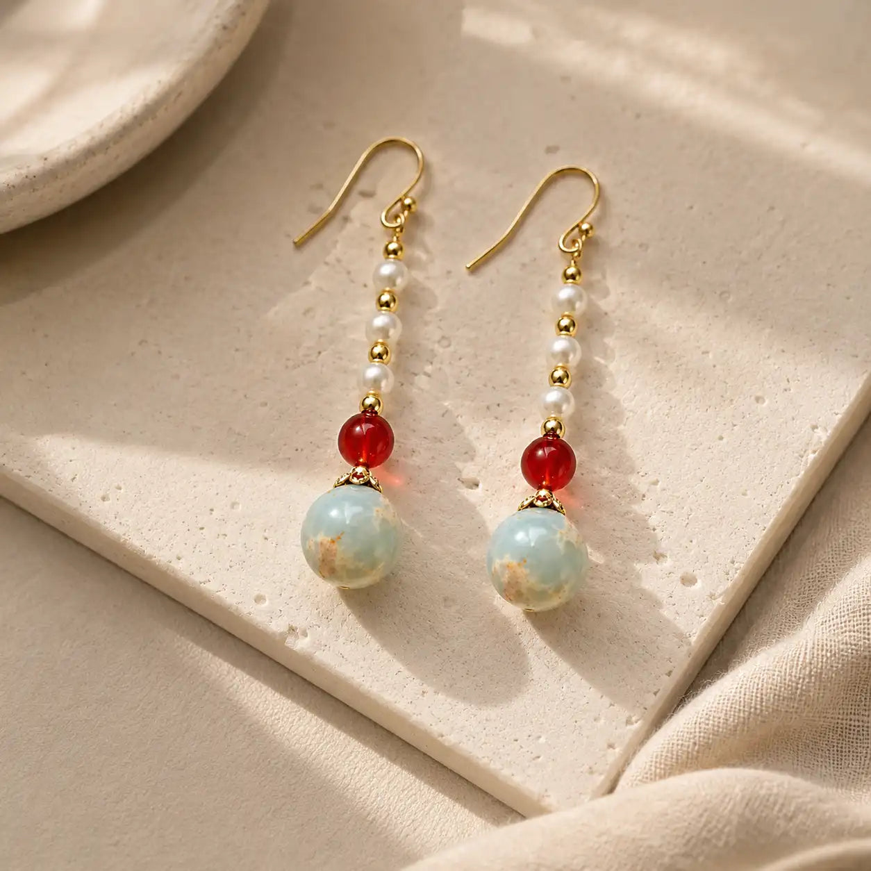 Shoushan Stone Red Agate Drop Earrings shown from another angle with agate