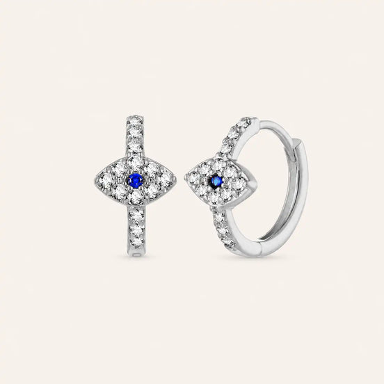 Silver evil eye huggie earrings by TheFuMaster