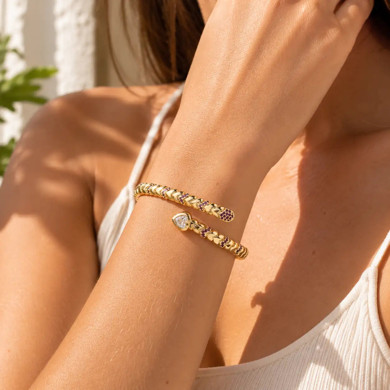 Snake Zircon Gold Cuff Bracelet shown from alternate angle with gold cuff detail