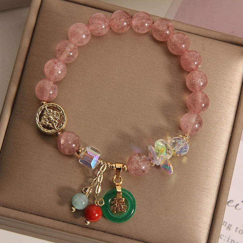 Close-up shot showing the Fu character charm and strawberry quartz beads symbolizing love – TheFuMaster