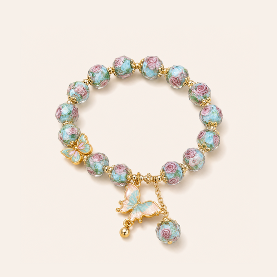 Teal glass butterfly bracelet by TheFuMaster