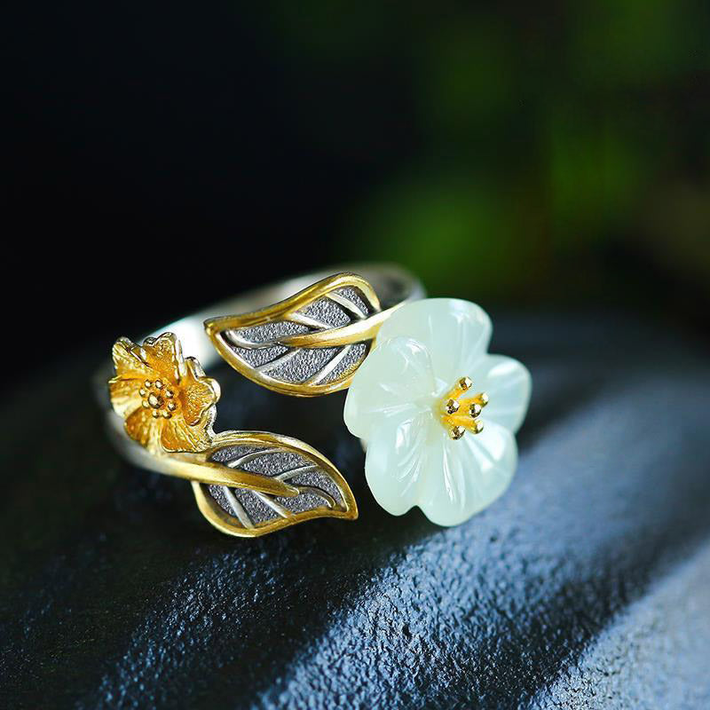 White Jade Plum Flower Leaf Ring by TheFuMaster, elegant handcrafted silver ring featuring white jade blossom and golden leaf detail
