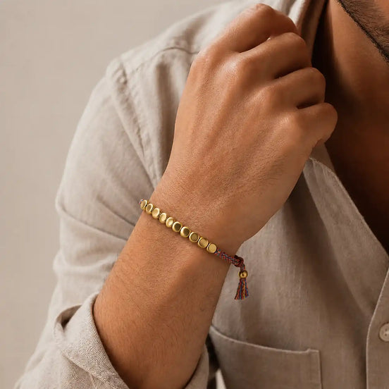 Tibetan copper bead bracelet worn on the wrist