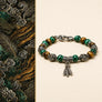 Retro Tiger Eye Sovereign Bracelet with green and brown beads and silver charms by TheFuMaster